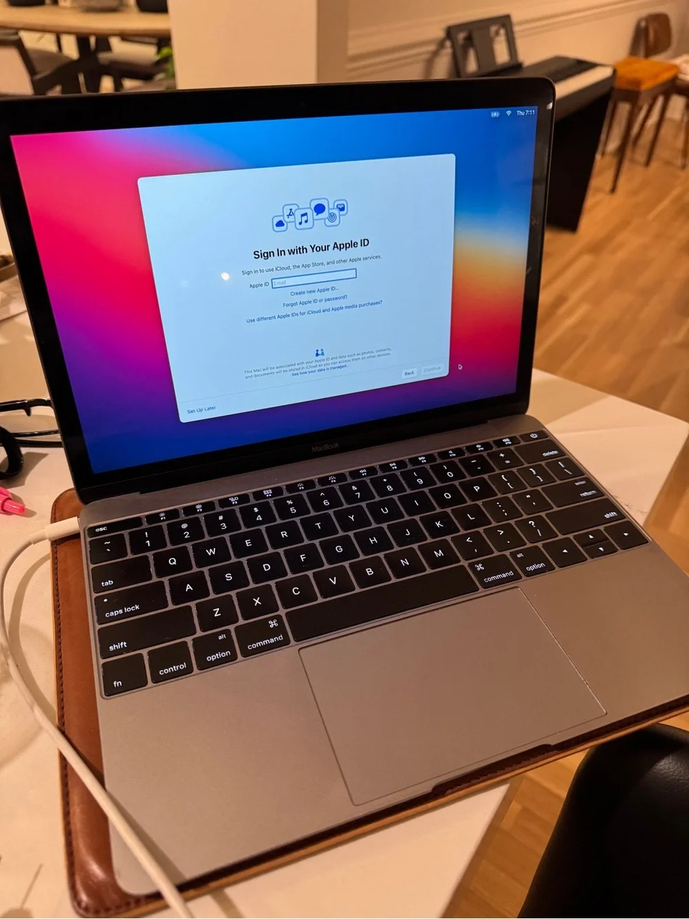 Used 2015 Apple MacBook in Space Gray with Charger and Sleeve case
